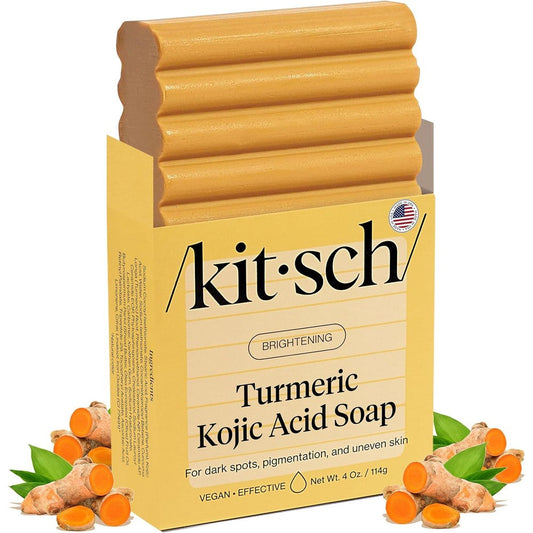 Kitsch Kojic Acid Soap front view of the packaging and four ounce turmeric bar
