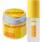 Handmade Heroes turmeric lip scrub and vitamin C lip oil set front view packaging
