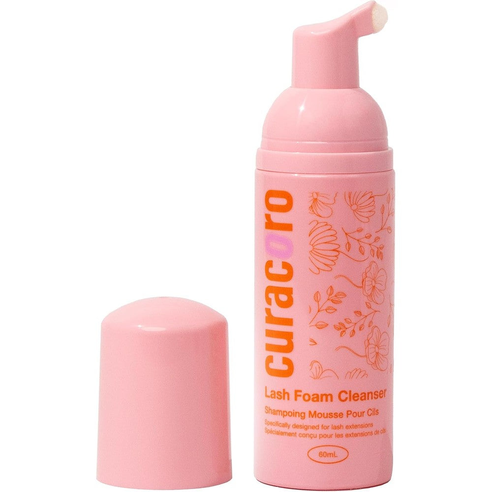 Curacoro Eyelash Extension Cleanser front view showing pink pump bottle packaging.