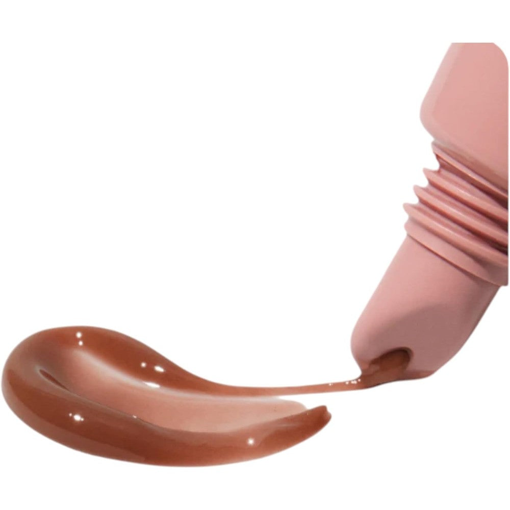 Rhode Peptide Lip Tint in Toast front view showing the sleek squeeze tube packaging.