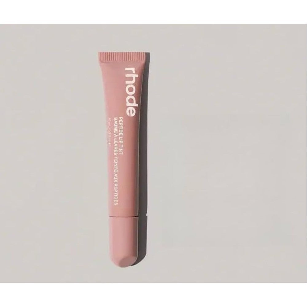 Rhode by Hailey Bieber Peptide Lip Tint Toast Rose Taupe front view of pink squeeze tube for high shine lip care