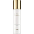 Guerlain Lait De Beaute Cleansing Milk front view bottle with gold cap luxury skincare