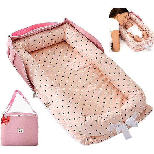 Perfuw newborn baby lounger front view in pink polka dot