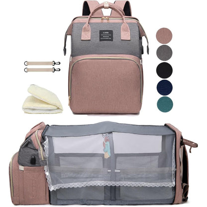Houscly diaper bag backpack with changing station front view in soft pink color.