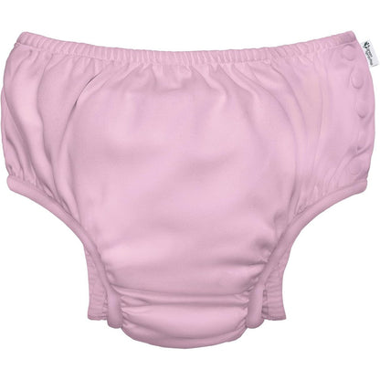Green Sprouts Reusable Baby Swim Diaper front view in light pink for infant pool safety.