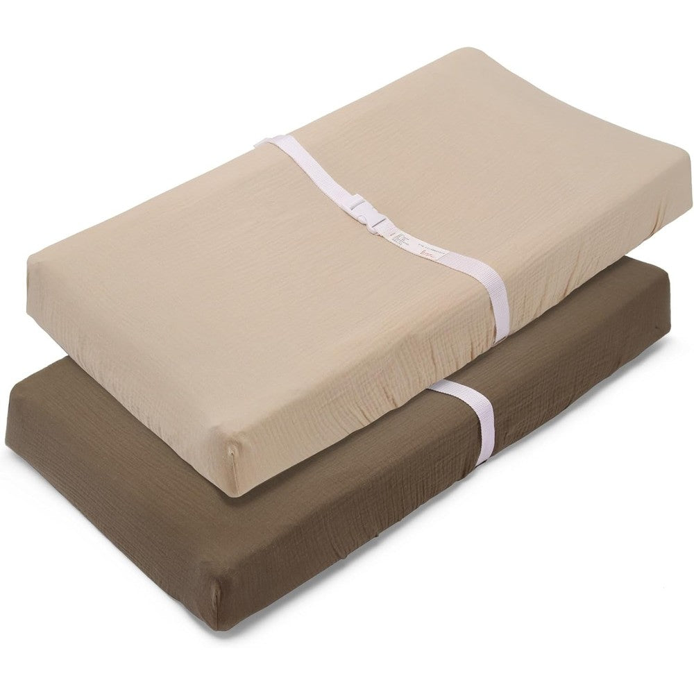 Pet Rejoir muslin changing pad cover front view on a standard diaper changing mat.