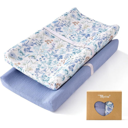 TILLYOU muslin changing pad cover front view showing the blue flower floral pattern package.