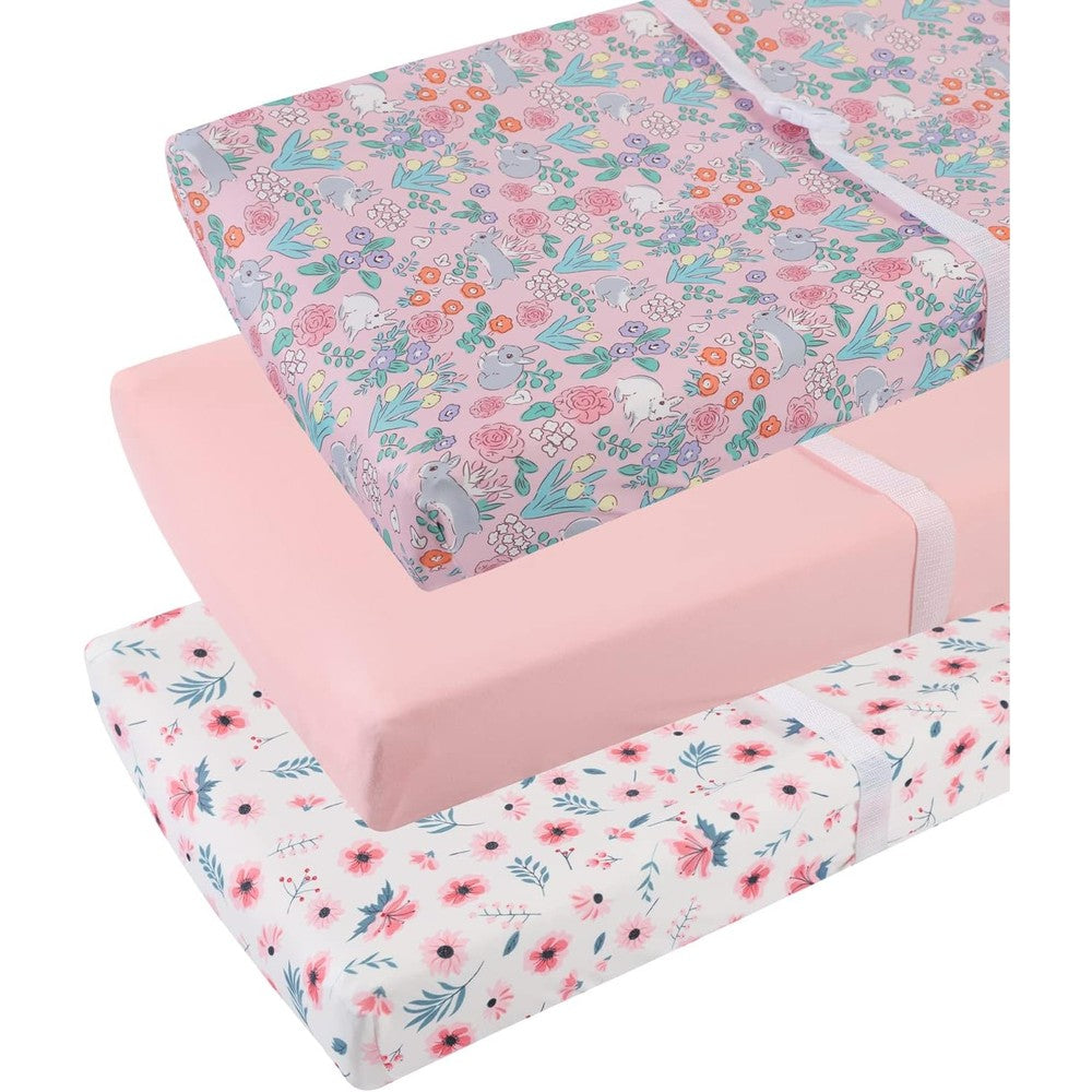 Tontukatu changing pad cover set front view showing three rolled jersey knit sheets in floral grey rabbit and pink.