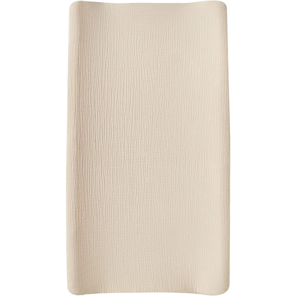 DONOMILO Muslin Changing Pad Cover front view showing the soft beige textured organic cotton fabric.