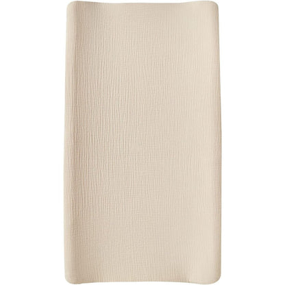 DONOMILO Muslin Changing Pad Cover front view showing the soft beige textured organic cotton fabric.