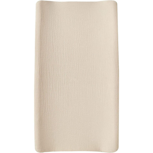 DONOMILO Muslin Changing Pad Cover front view showing the soft beige textured organic cotton fabric.