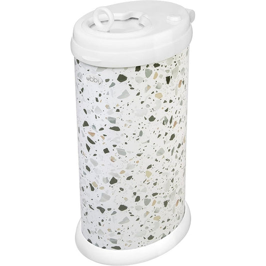 Ubbi Steel Diaper Pail Terrazzo front view in modern baby nursery room