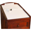 Athena changing pad front view showing white vinyl waterproof surface