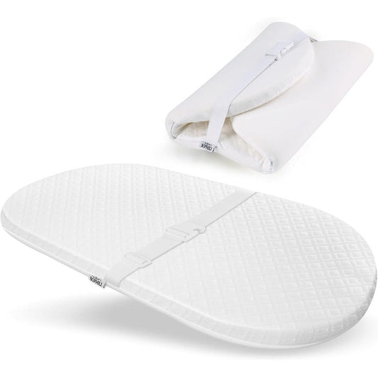 Bophili oval bassinet mattress front view showing quilted texture.