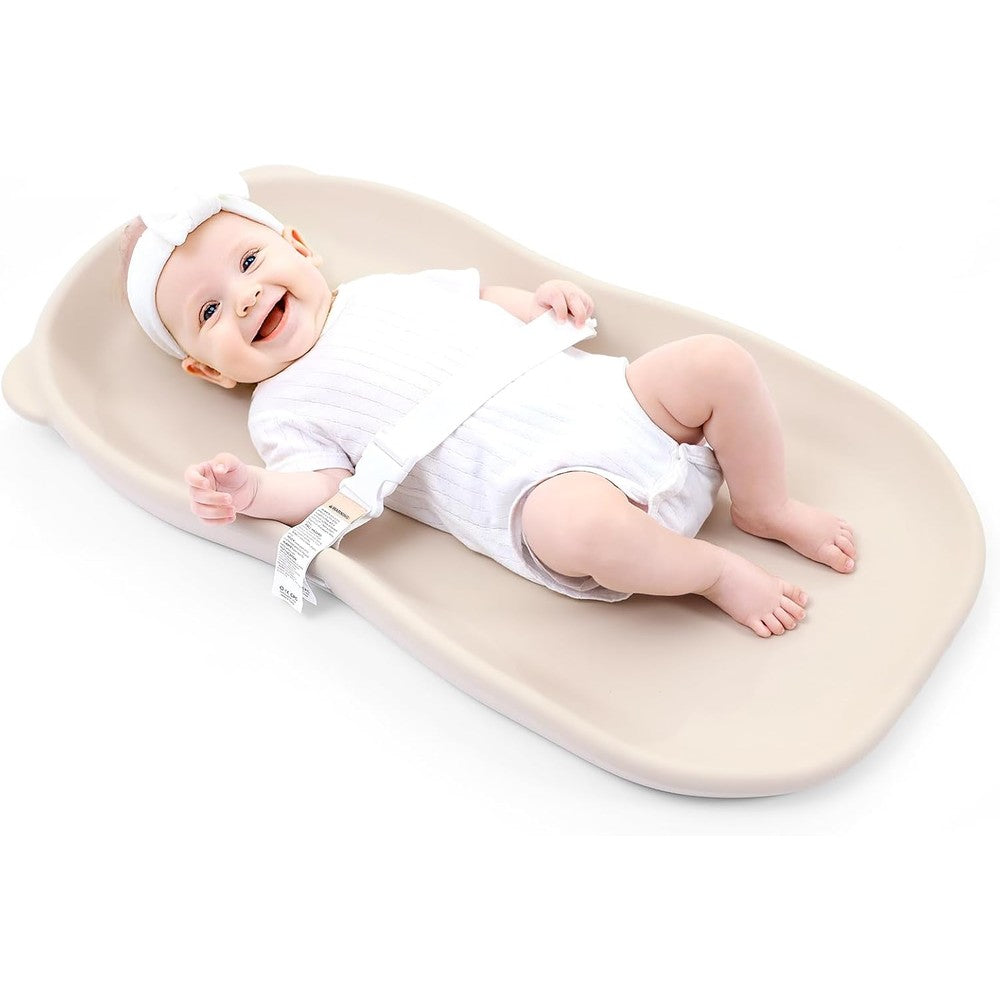 Knirose wipe-clean baby diaper changing pad front view placed on a wooden nursery dresser table.