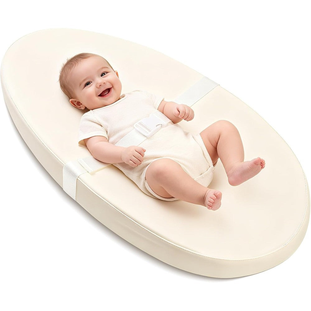 Qalvyn baby changing pad for dresser front view showcasing beige contoured design