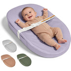 JVEOO vegan leather baby changing pad front view showing the light purple waterproof surface and safety strap.