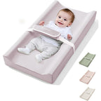 Comomy baby changing pad front view with premium lavender waterproof cover on a wooden dresser.