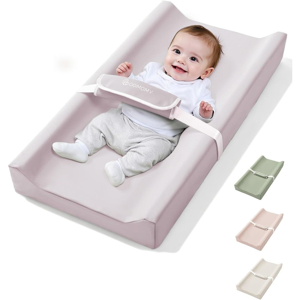 Comomy baby changing pad front view with premium lavender waterproof cover on a wooden dresser.