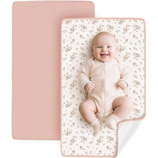 Konssy waterproof muslin cotton portable changing pad front view in pink blossom print.