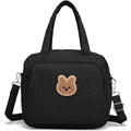 Fwkekye small diaper bag tote front view showcasing black quilted nylon and bear patch.