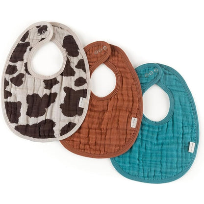 Itzy Ritzy set of 3 cow print muslin baby bibs front view