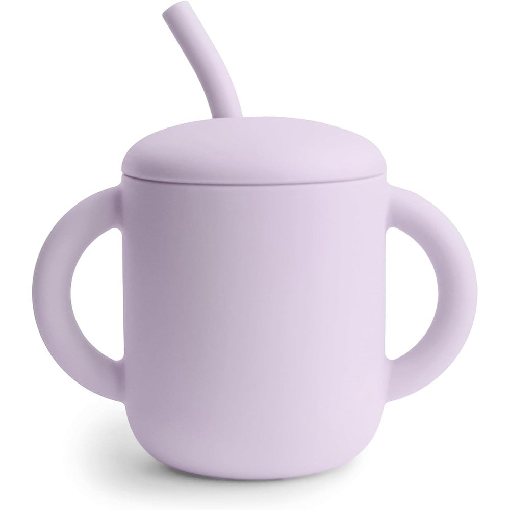 Mushie silicone training cup and straw soft lilac front view on table