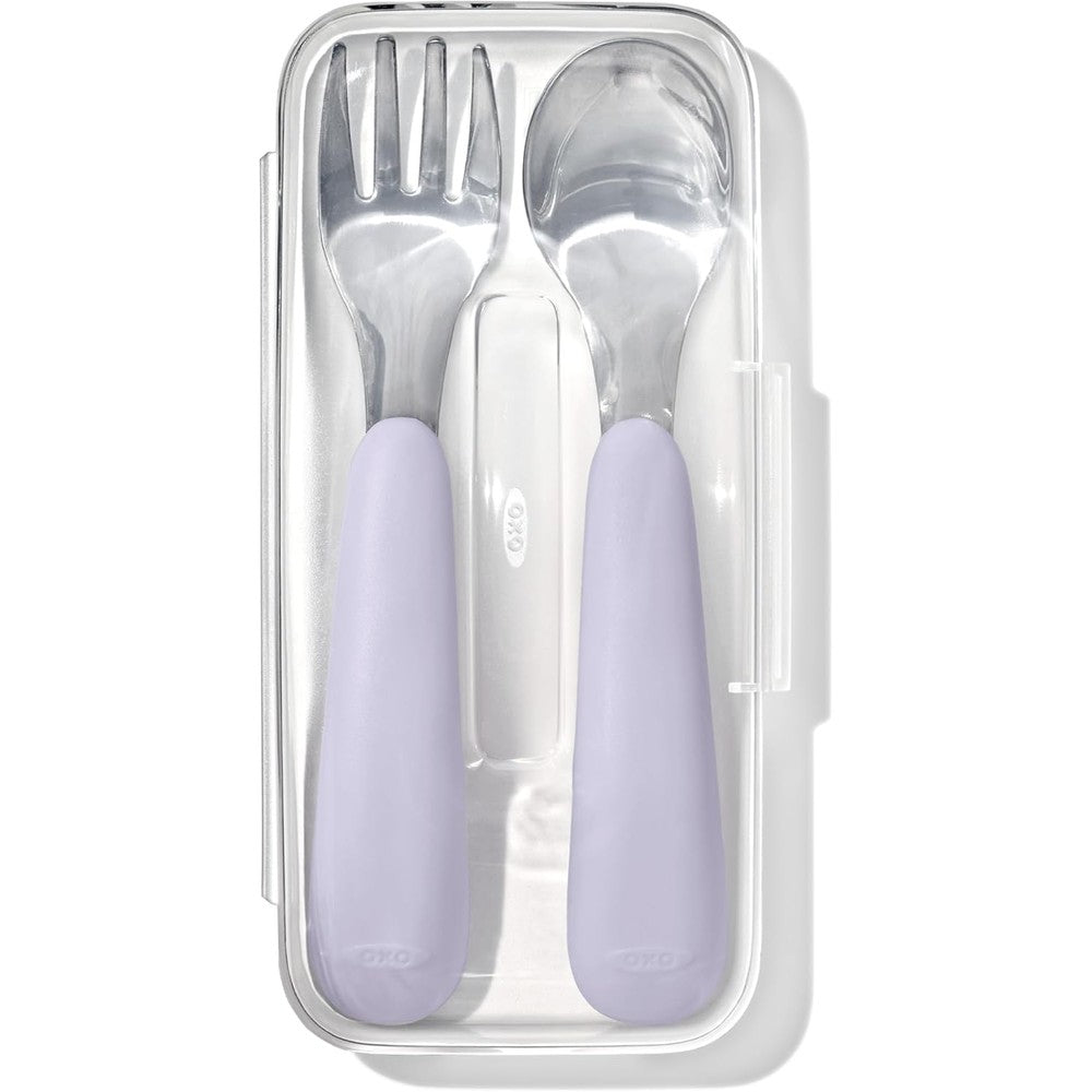 OXO Tot On-The-Go Fork and Spoon Set Lilac front view inside its open translucent travel carrying case.