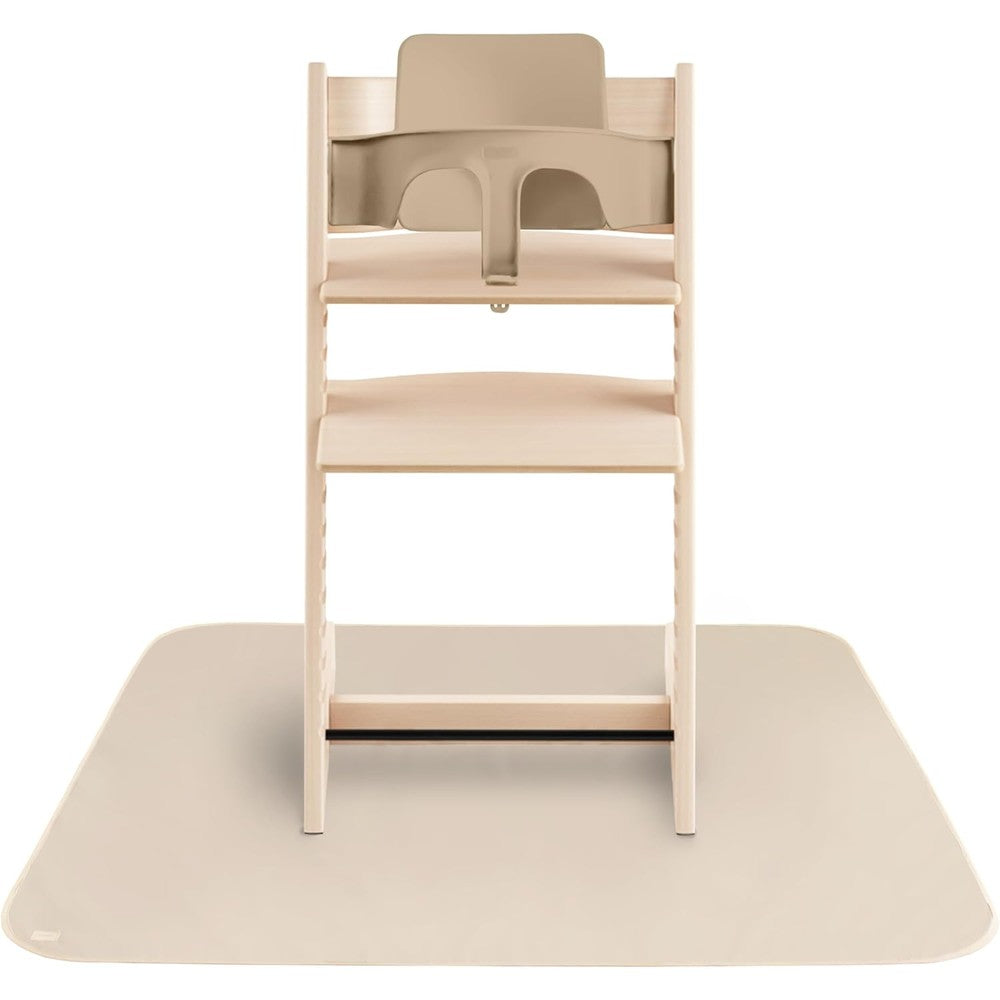 Mushie Baby Splat Mat in Fog front view under a wooden high chair