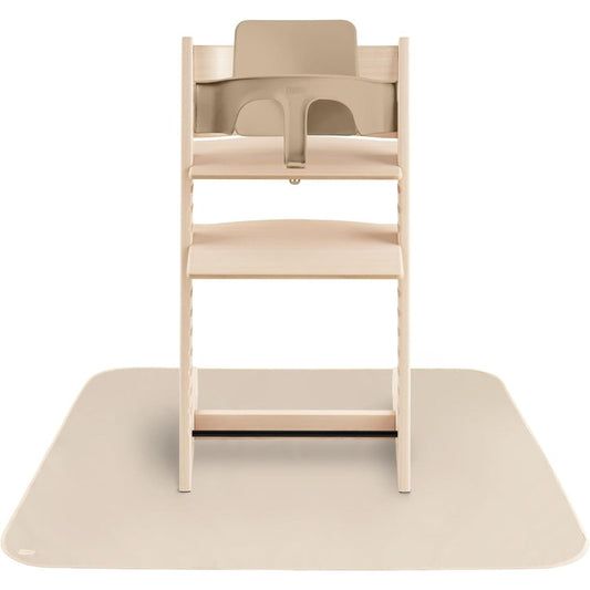 Mushie Baby Splat Mat in Fog front view under a wooden high chair