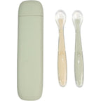 Little Rawr silicone baby feeding spoons green front view of two training utensils inside their protective clear storage box.