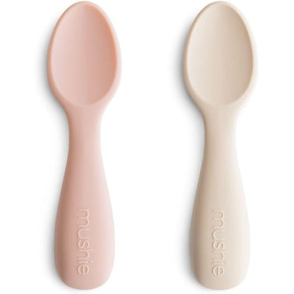 Mushie Silicone Toddler Starter Spoons front view of Blush and Shifting Sand premium baby self feeding set