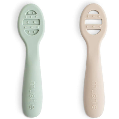 Mushie Silicone First Feeding Baby Spoons front view in Cambridge Blue and Shifting Sand