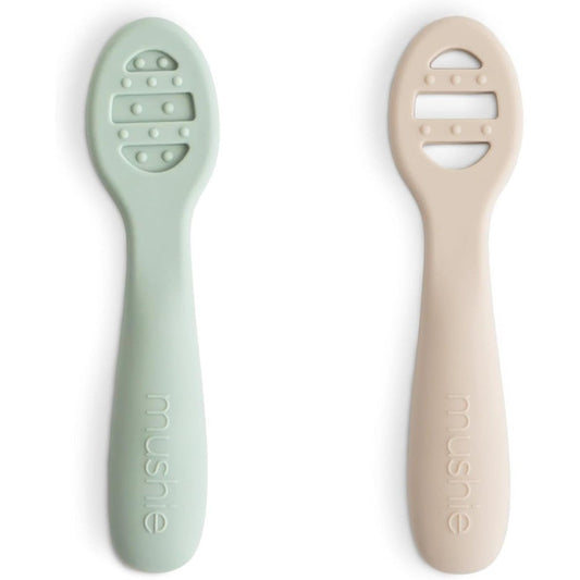 Mushie Silicone First Feeding Baby Spoons front view in Cambridge Blue and Shifting Sand