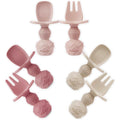 PandaEar silicone baby spoons and fork feeding set front view showing pink self-feeding utensils for weaning.