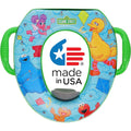Sesame Street Let's Fly a Kite soft potty seat front view showing the colorful cartoon graphics and easy grip handles.