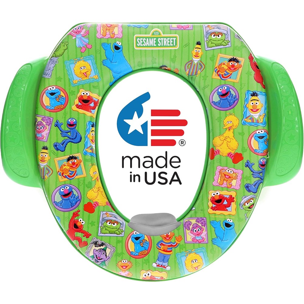 Sesame Street Framed Friends soft potty seat front view showing green base and Elmo graphics
