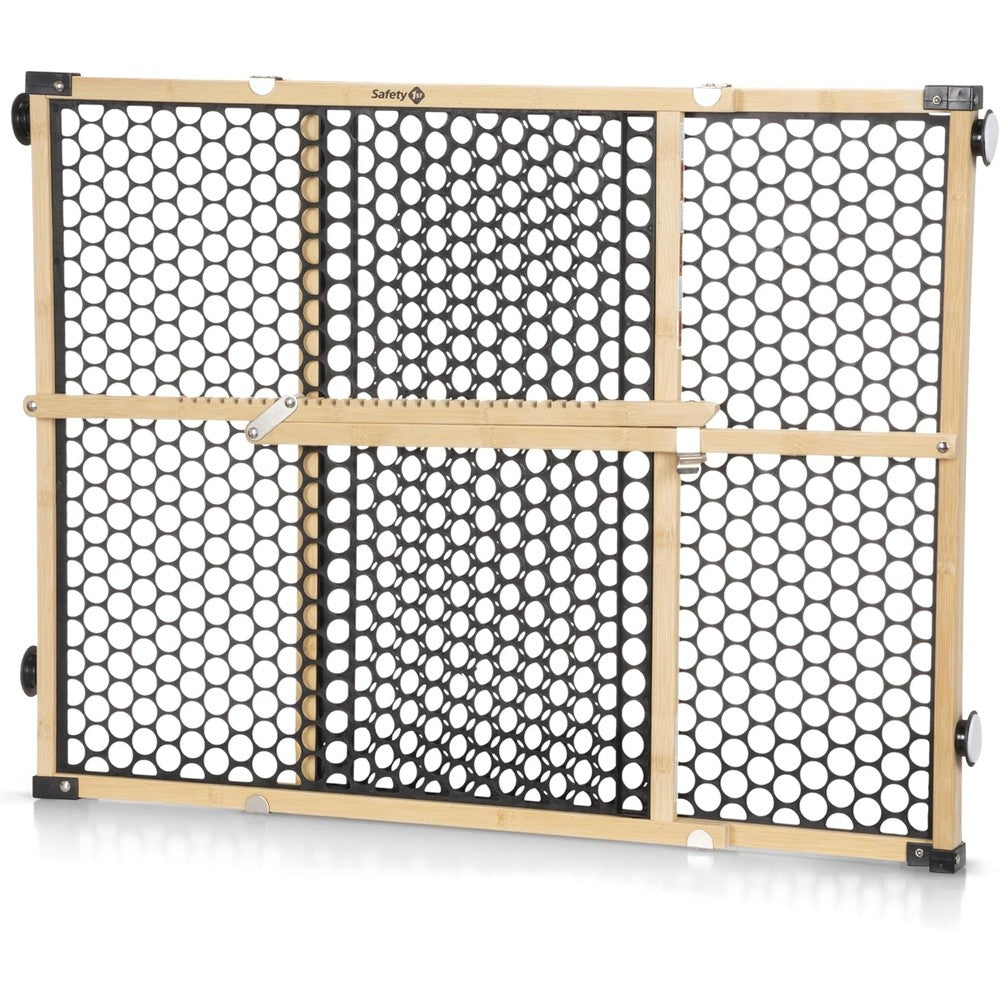 Safety 1st Nature Next Bamboo Baby Gate front view installed securely in a modern home wooden doorway.