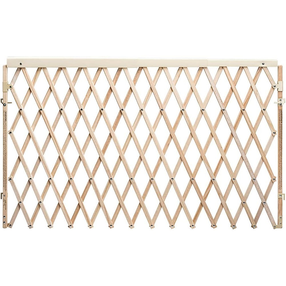 Evenflo Expansion Walk Thru Baby Gate natural wood front view installed in wide doorway