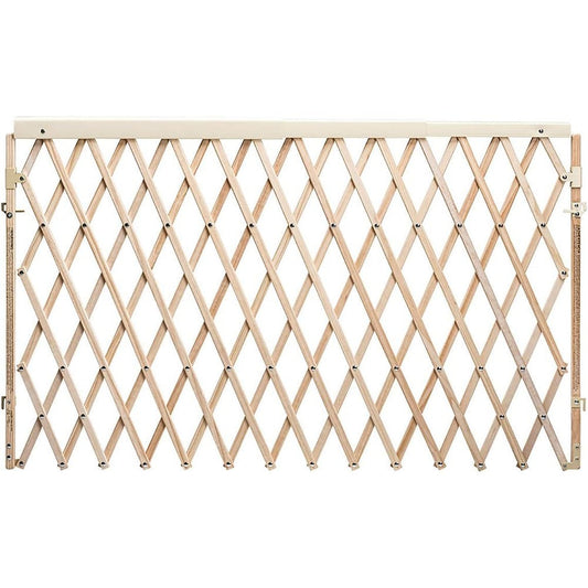 Evenflo Expansion Walk Thru Baby Gate natural wood front view installed in wide doorway
