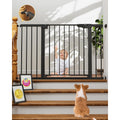 Cumbor baby gate black front view installed in a wide home doorway
