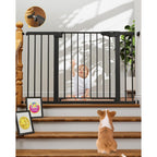 Cumbor baby gate black front view installed in a wide home doorway