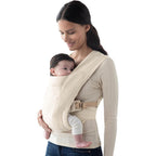 Ergobaby Embrace newborn baby carrier in cream color front view