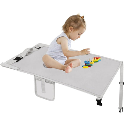 Lex Tavis toddler airplane bed front view installed between economy airline seats.