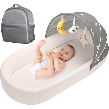 Bnakkon portable baby nest lounger in grey front view showcasing internal mattress padding