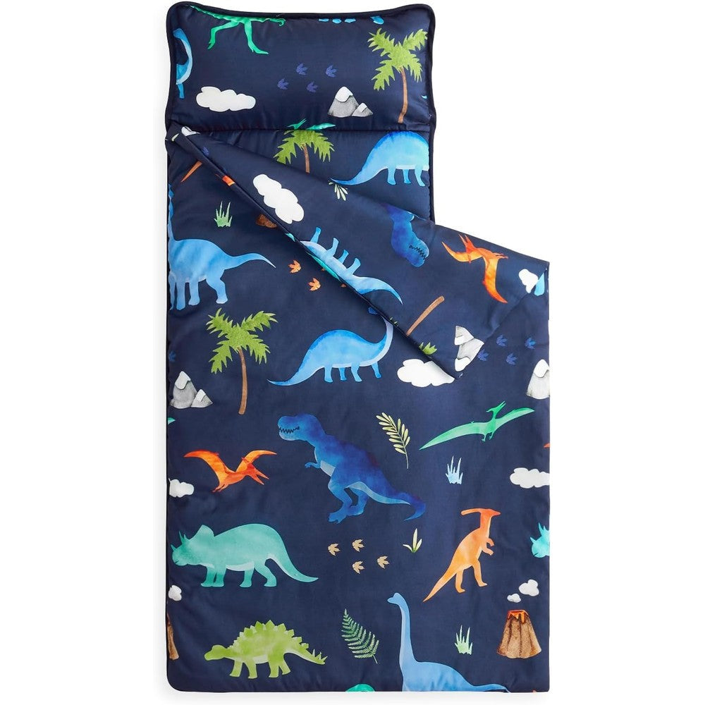 Wake In Cloud toddler nap mat front view showing colorful dinosaur pattern on navy blue fabric.