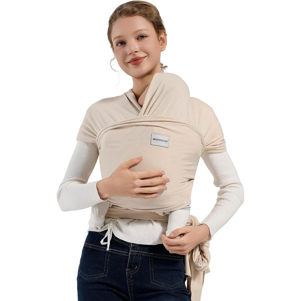 Misswisdom baby wrap carrier front view featuring an infant safely placed in a beige cotton sling.