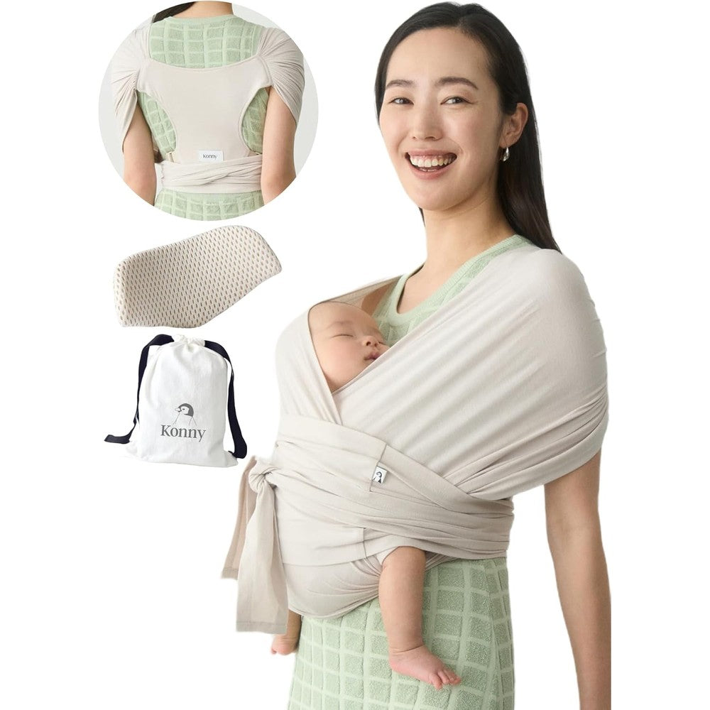 Konny Baby Carrier Flex SoftBreeze neutral beige front view on a parent carrying a newborn infant.