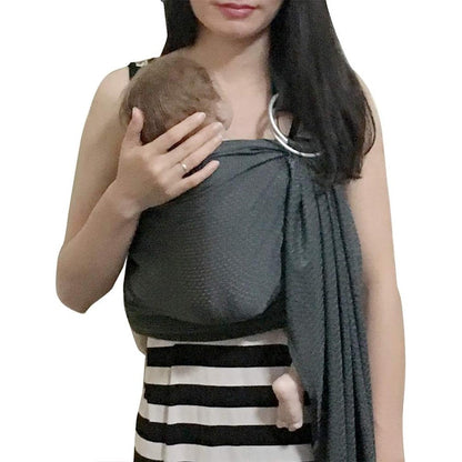 Vlokup baby water ring sling carrier grey front view on parent