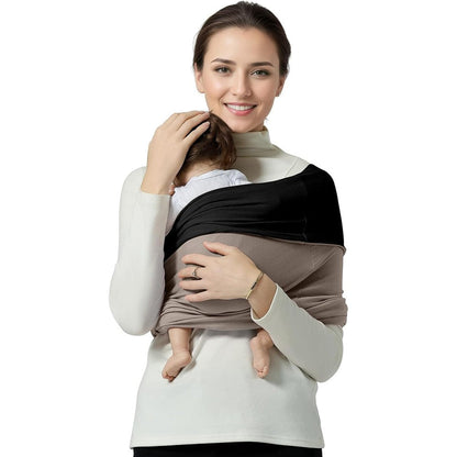 Shiaon baby wrap carrier front view showing the secure black and brown cotton sling design on a parent.